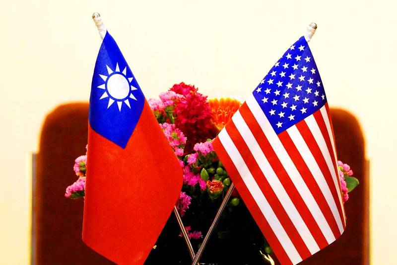 The flags of Taiwan and the US are pictured at the Legislative Yuan in Taipei on March 27, 2018.
Photo: Tyrone Siu, Reuters