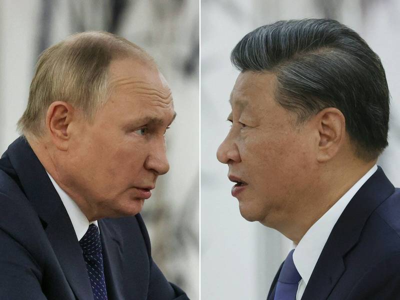 俄罗斯总统普廷（左）与中国国家主席习近平15日在乌兹别克举行双边会谈。（法新社）(photo:LTN)