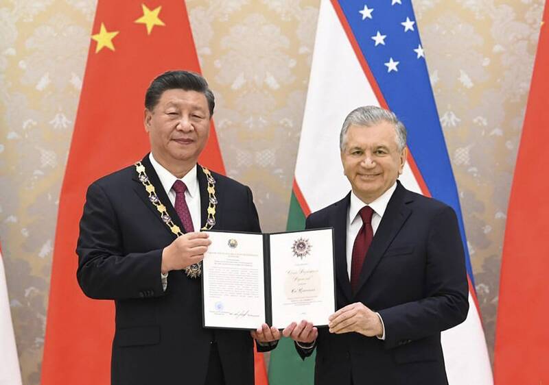 乌兹别克总统新闻办公室今天表示，在中国国家主席习近平与乌兹别克总统米尔济约耶夫举行会谈后，中乌两国签署了总额150亿美元（新台币约4680亿元）的合约和协议。（欧新社）(photo:LTN)