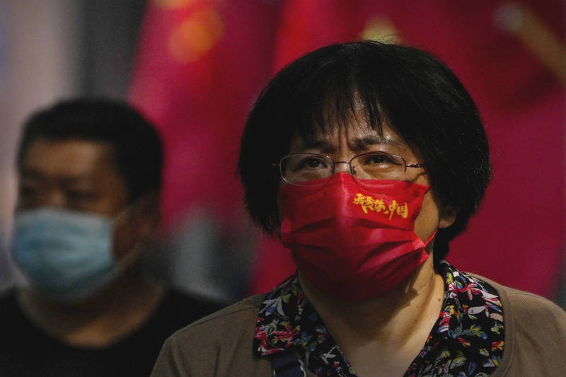 中国国庆连假「黄金週」在即，但武汉肺炎疫情影响仍在，该国已有24个省唿吁民众「就地过节」。（美联社）(photo:LTN)
