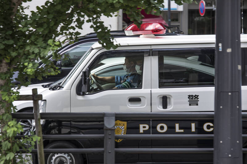 日本香川縣警方接獲報案，有女子躺在路邊全身著火。消防隊員趕到現場時火已熄滅，女子也傷重身亡。示意圖。（彭博資料照）