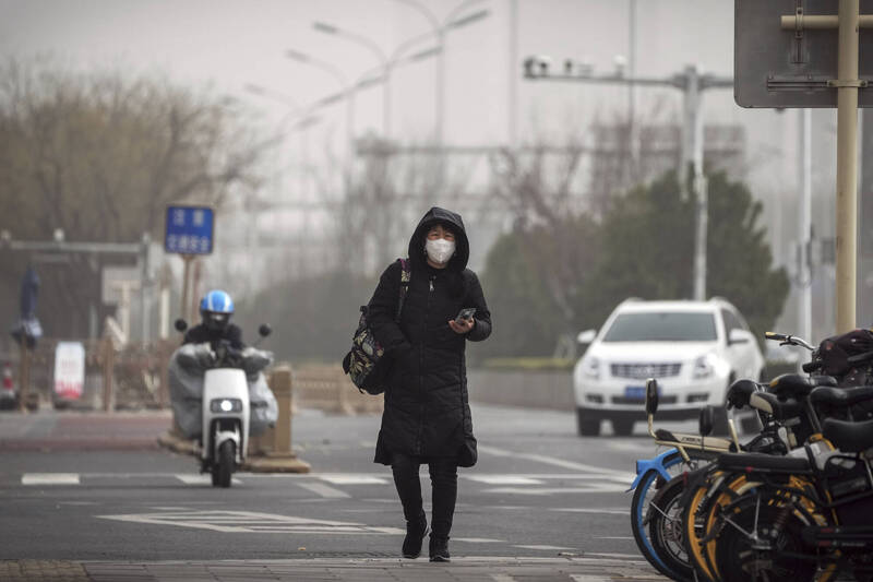 北京市疫情日益严峻，市民担心受感染多选择家里蹲，街头反而比执行封控期间还冷清。（美联社）(photo:LTN)