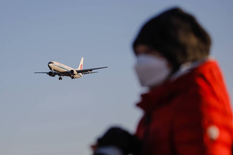 27日在北京首都机场准备降落的客机。（欧新社档案照）(photo:LTN)