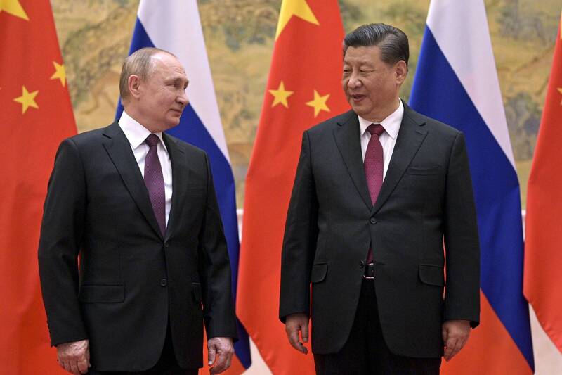 俄罗斯总统普廷（左）透露，中国国家主席习近平可望于明春赴俄进行国是访问。图为习普今年2月初在北京会面。（美联社）(photo:LTN)