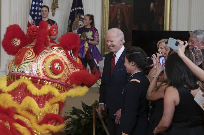 白宫首次举办「农历新年」庆祝活动，总统拜登观看舞龙舞狮表演。（欧新社）(photo:LTN)