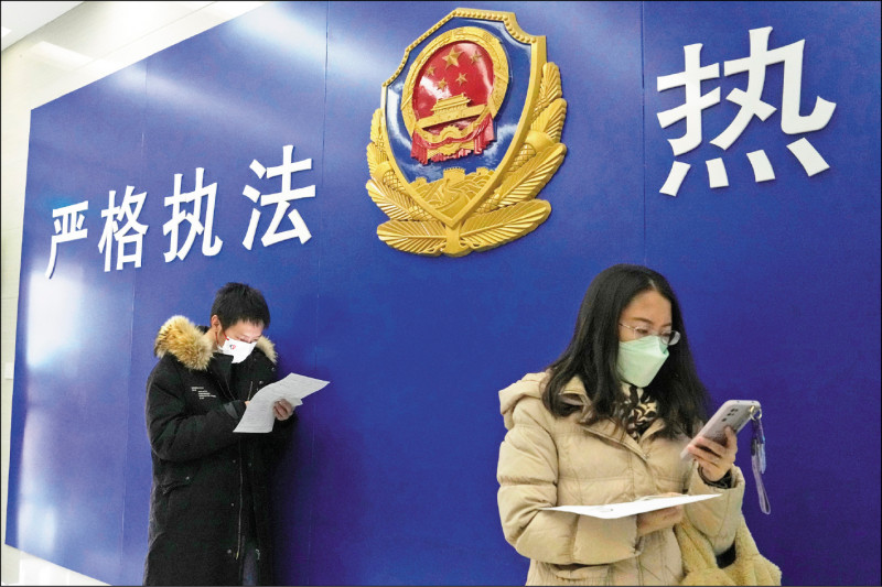 中国跨境执法行为引起各国关注。图为中国首都北京一处警察局。（美联社档案照）(photo:LTN)