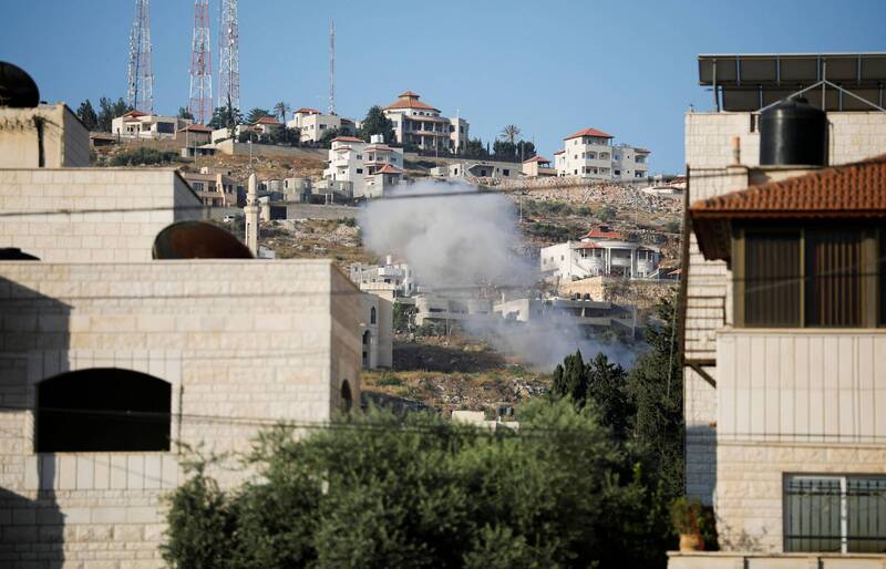 以色列軍隊19日朝約旦河西岸城市傑寧（Jenin）發動突襲，爆發嚴重衝突，造成2名巴勒斯坦人死亡，並有28人受傷，圖為衝突現場。（路透）