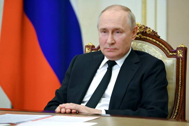 俄罗斯总统普廷短时间忘了与他人的谈话内容，让外界怀疑他罹患了失智。（美联社）(photo:LTN)