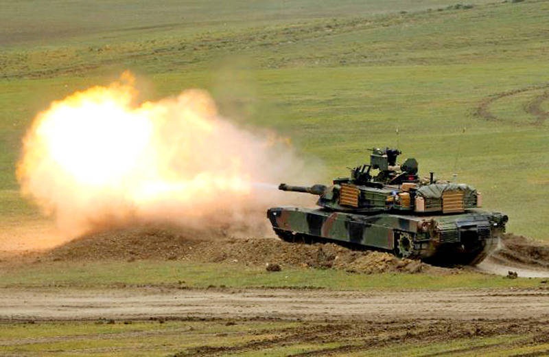 
An Abrams M1A2 tank fires a shell in an undated photograph.
Photo: Reuters