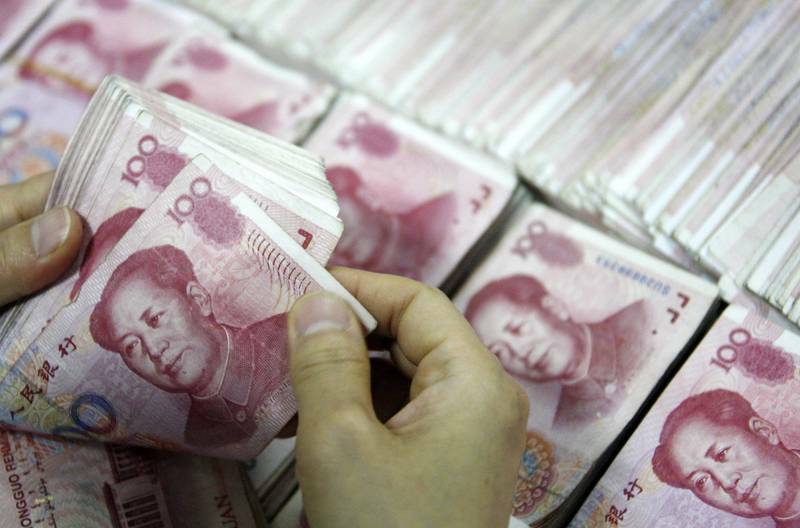 为支撑人民币，中国已减持40%美国国债。（路透资料照）(photo:LTN)