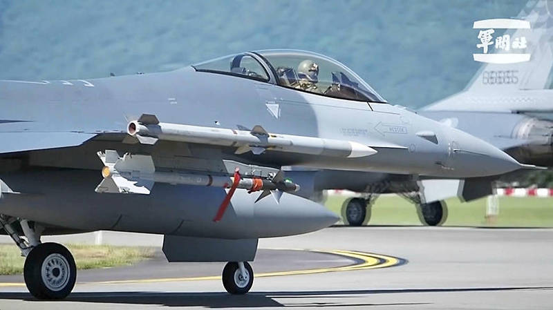 In a screen grab from video released by the Taiwan Military News Agency, F-16 fighter jets taxi on a runway at Hualien Air Force Base on Aug. 20.
Photo courtesy of the Taiwan Military News Agency via AP