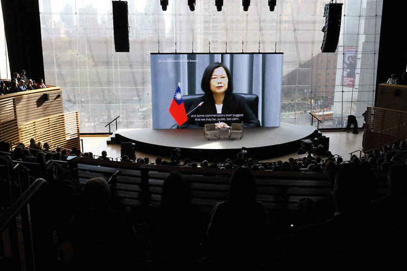 
An interview between journalist Andrew Ross Sorkin and President Tsai Ing-wen is displayed on a screen during the 