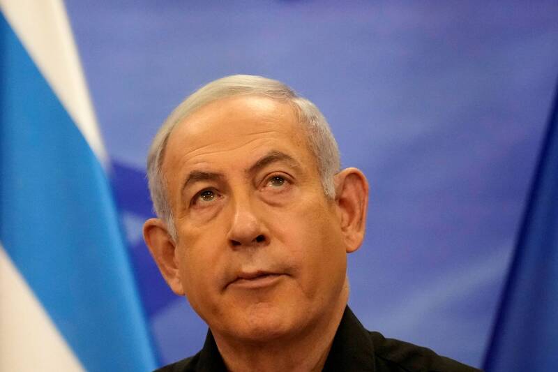 俄罗斯8日对安理会唿吁以哈停火的决议投下赞成票，以色列总理纳坦雅胡（见图）为此向俄罗斯总统普廷表达不满。（路透）(photo:LTN)
