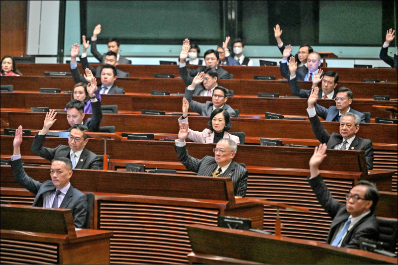 香港立法会19日晚间三读全票通过基本法23条立法草案「维护国家安全条例草案」，相关条例今后将与香港国安法一併成为港府处理国安罪行的法令。（法新社）(photo:LTN)