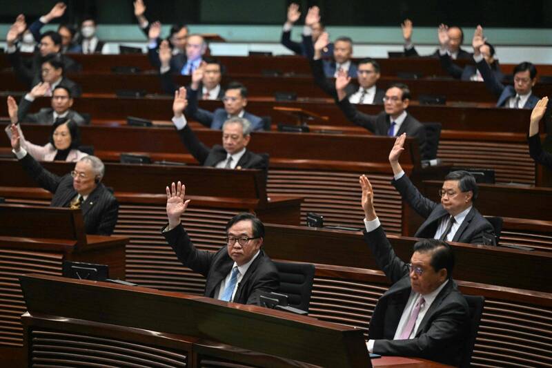 香港立法会19日「无异议」通过「基本法」23条，引发外界批评。（法新社）(photo:LTN)