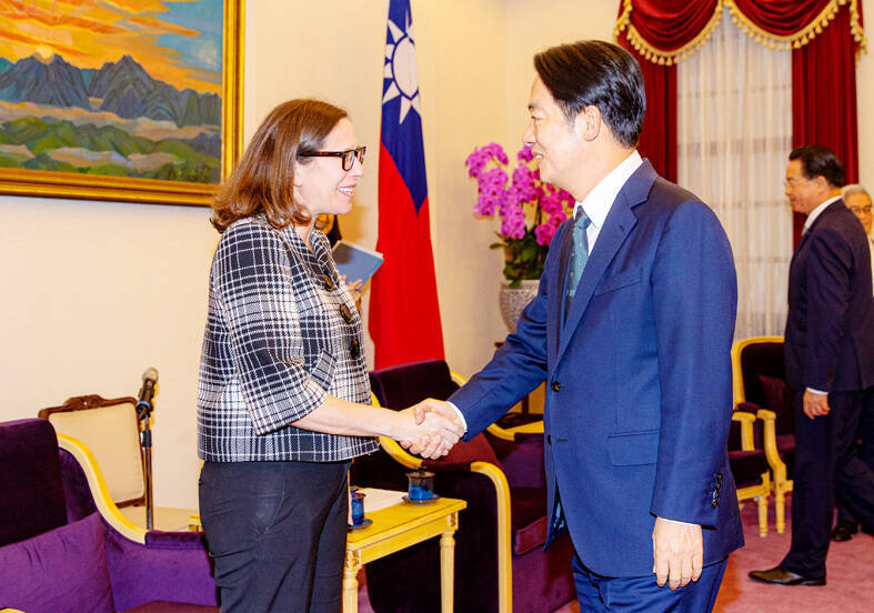 American Institute in Taiwan Chair Laura Rosenberger, left, shakes hands with Vice President William Lai at the Presidential Office in Taipei yesterday.
Photo: CNA
American Institute in Taiwan Chair Laura Rosenberger, left, shakes hands with Vice President William Lai at the Presidential Office in Taipei yesterday.
Photo: CNA