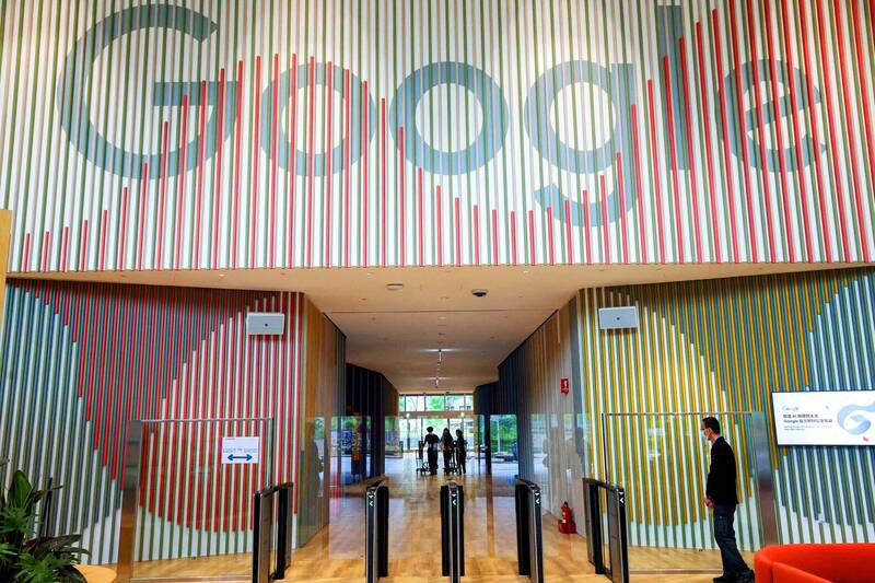 
A man walks pass the entrance of Google’s new hardware engineering hub in in New Taipei City’s Banciao District yesterday.
Photo: CNA