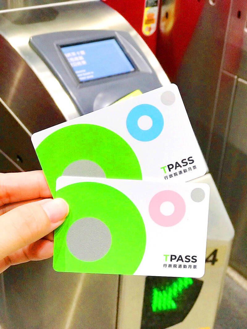 Two TPass cards are held near an MRT ticket gate in an undated photograph.
Photo courtesy of Easycard Corp Two TPass cards are held near an MRT ticket gate in an undated photograph.
Photo courtesy of Easycard Corp
