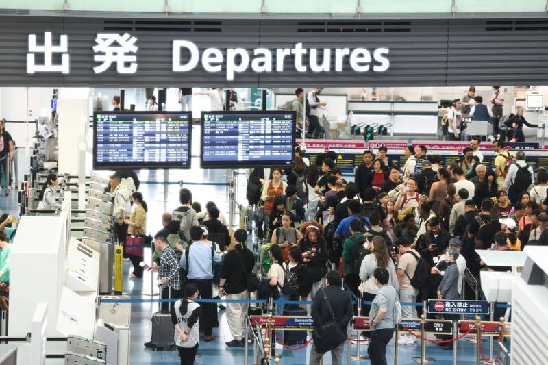 日本計畫明年1月推出「預先通關」（Preclearance）系統，台灣旅客將優先適用。（彭博）