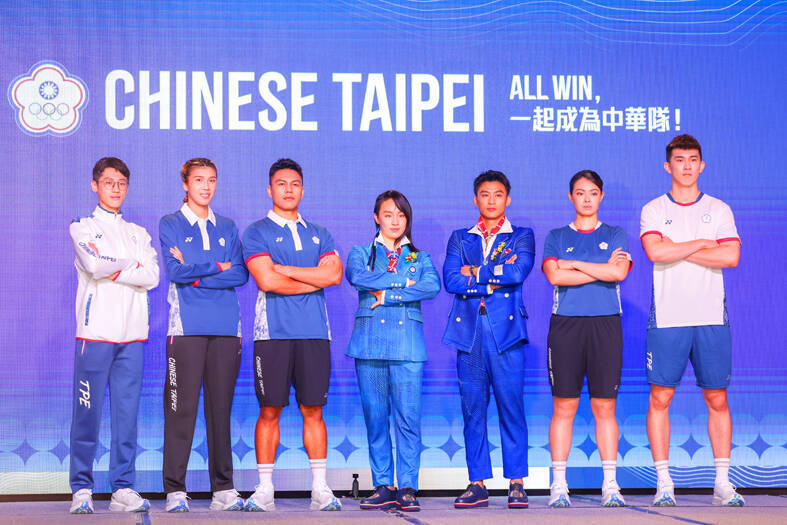 
Taiwanese athletes model the nation’s uniforms to be worn at the Paris Olympics at a news conference in Taipei on June 24. 
Photo: CNA