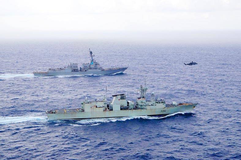 US Navy guided-missile destroyer USS Chung-Hoon, top, sails alongside the Royal Canadian Navy frigate HMCS Montreal during Surface Action Group operations as a part of exercise “Noble Wolverine” in the South China Sea on May 30 last year.
Photo: US Navy / Naval Air Crewman (Helicopter) 1st Class Dalton Cooper / Handout via Reuters
US Navy guided-missile destroyer USS Chung-Hoon, top, sails alongside the Royal Canadian Navy frigate HMCS Montreal during Surface Action Group operations as a part of exercise “Noble Wolverine” in the South China Sea on May 30 last year.
Photo: US Navy / Naval Air Crewman (Helicopter) 1st Class Dalton Cooper / Handout via Reuters