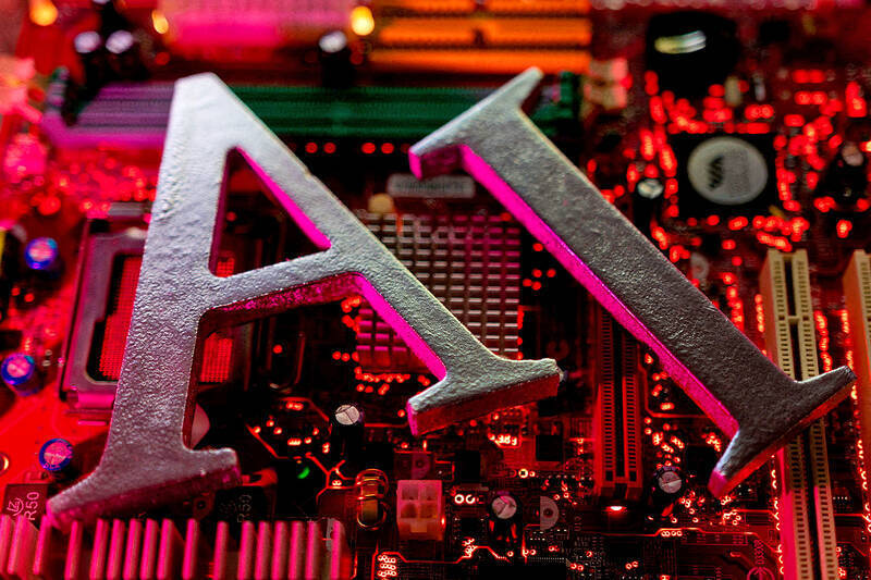 
The letters AI are pictured on a motherboard in an arranged photograph. 
Photo: Reuters