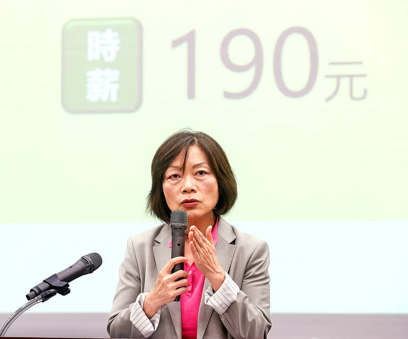 Minister of Labor Ho Pei-shan speaks at a news conference in Taipei yesterday.
Photo: CNA