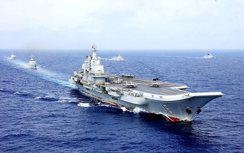 
Chinese aircraft carrier the Liaoning takes part in a military drill of the Chinese People’s Liberation Army Navy in the western Pacific on April 18, 2018.
Photo: Reuters