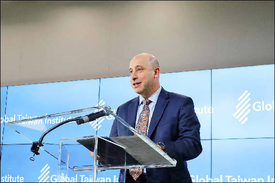 
US Deputy Assistant Secretary of Defense for China, Taiwan and Mongolia Michael Chase speaks at the Global Taiwan Institute’s annual symposium in Washington on Wednesday.
Photo: CNA