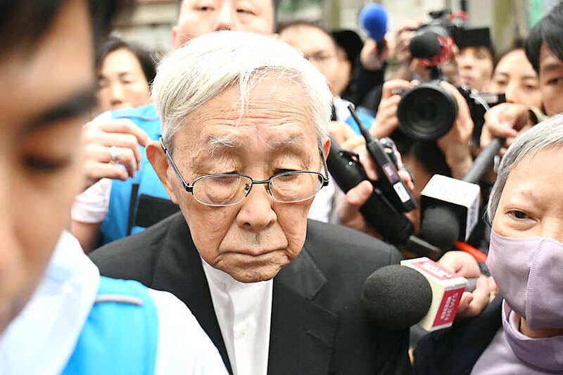 Joseph Zen, a 92-year-old retired cardinal of the Catholic Church, leaves Hong Kong’s West Kowloon Magistrates’ Court, which yesterday sentenced 45 pro-democracy activists to up to 10 years in prison. 
Photo: AFP