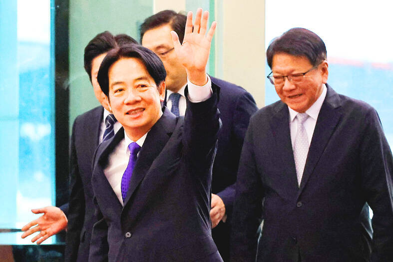 
President William Lai waves at Taiwan Taoyuan International Airport yesterday as he leaves on a trip to Pacific island allies.
Photo: Ann Wang, Reuters