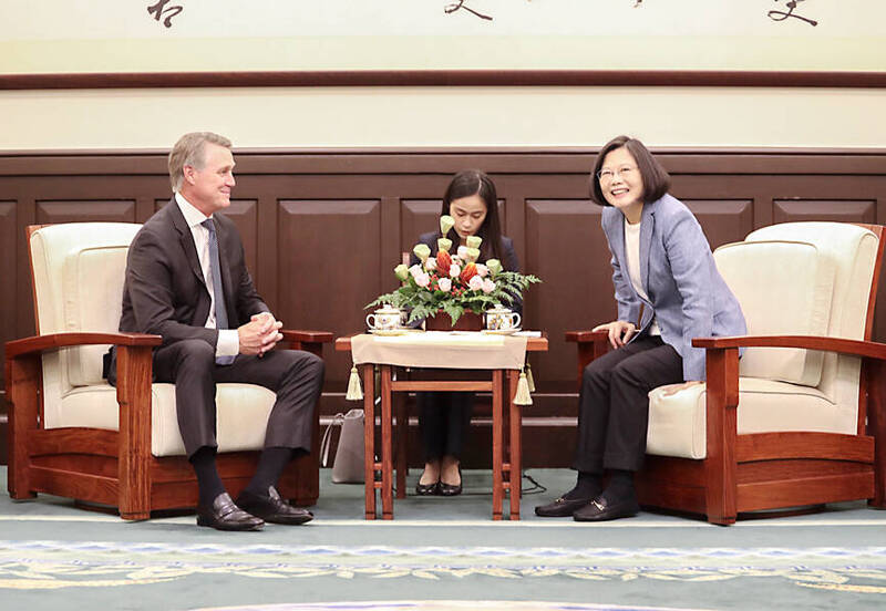 
Then-president Tsai Ing-wen, right, speaks with then-US senator David Perdue at the Presidential Office Building in Taipei on June 1, 2018. 
Photo: CNA