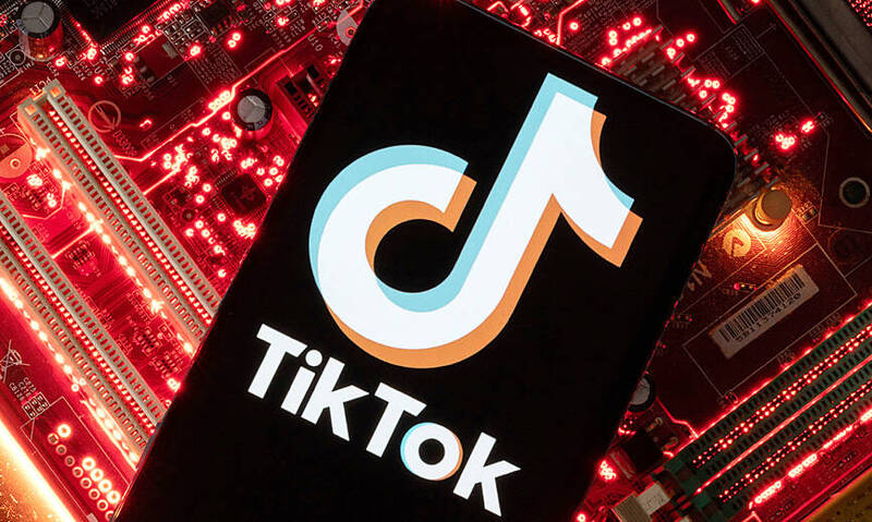 
A smartphone displaying a TikTok logo is placed on a computer motherboard in this illustration taken on Feb. 23 last year.
Photo: Reuters