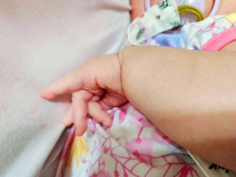 A baby’s arm is pictured yesterday.
Photo: CNA