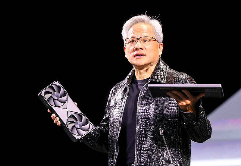 Nvidia CEO Jensen Huang holds a new Nvidia GeForce RTX 5090 graphics card and an RTX 5070 laptop as he gives a keynote address at CES 2025 in Las Vegas on Monday.
Photo: Reuters
Nvidia CEO Jensen Huang holds a new Nvidia GeForce RTX 5090 graphics card and an RTX 5070 laptop as he gives a keynote address at CES 2025 in Las Vegas on Monday.
Photo: Reuters
