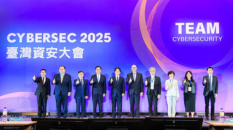 From fourth left, National Security Council Secretary-General Joseph Wu, President William Lai and American Institute in Taiwan Director Raymond Greene gesture along with other guests at the opening of the Cybersec Expo in Taipei yesterday.
Photo: screen grab from the Presidential Office’s Flickr page From fourth left, National Security Council Secretary-General Joseph Wu, President William Lai and American Institute in Taiwan Director Raymond Greene gesture along with other guests at the opening of the Cybersec Expo in Taipei yesterday.
Photo: screen grab from the Presidential Office’s Flickr page