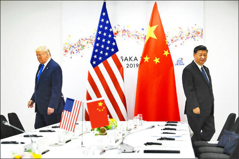 美國總統川普對中國大打關稅戰,已導致中國許多工廠的訂單減少,開始放慢生產速度並讓部分工人休無薪假。(法新社資料照) 美國總統川普對中國大打關稅戰,已導致中國許多工廠的訂單減少,開始放慢生產速度並讓部分工人休無薪假。(法新社資料照)