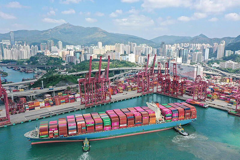 A container ship docking at the Kwai Chung container terminal in Hong Kong is pictured from the air on Oct. 22 last year.
Photo: AFP
