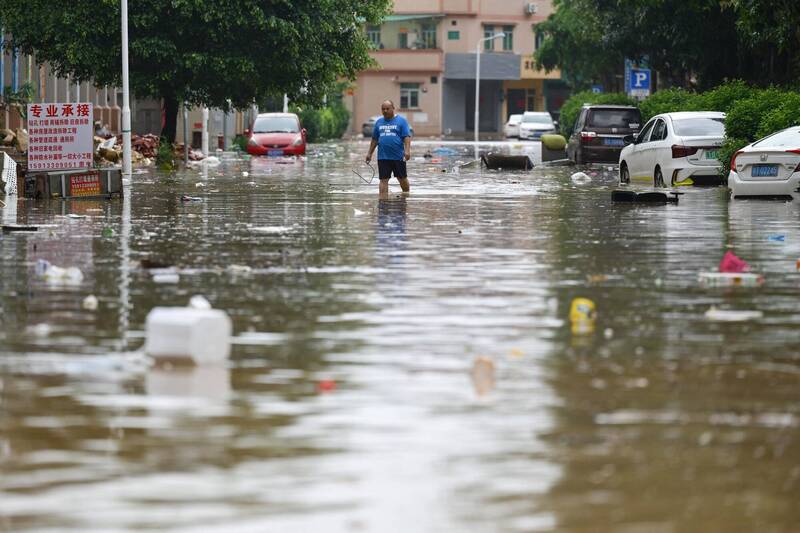 當地氣象部門認定此次洪水為「超百年一遇」。（法新社）