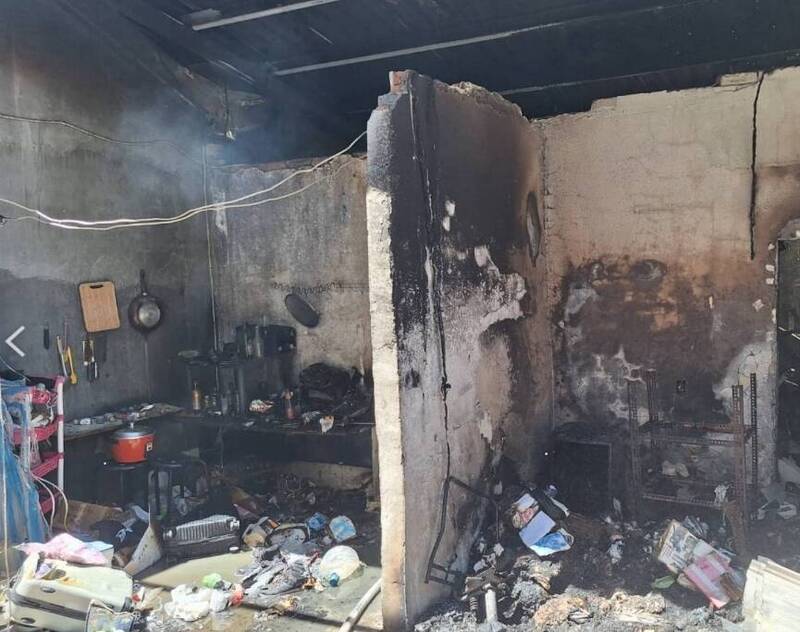 台北市北投區杏林一路一處民宅今日上午發生火警。（記者劉慶侯翻攝）註：警提供