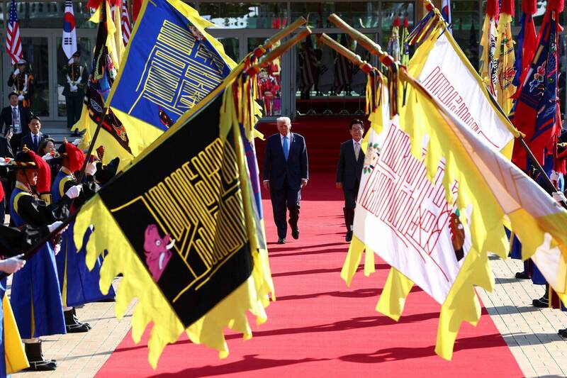 李在明以盛大仪式欢迎川普到访。（路透）