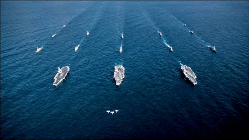 圖為美軍航空母艦雷根號、尼米茲號和羅斯福號，示意圖。（路透資料照）