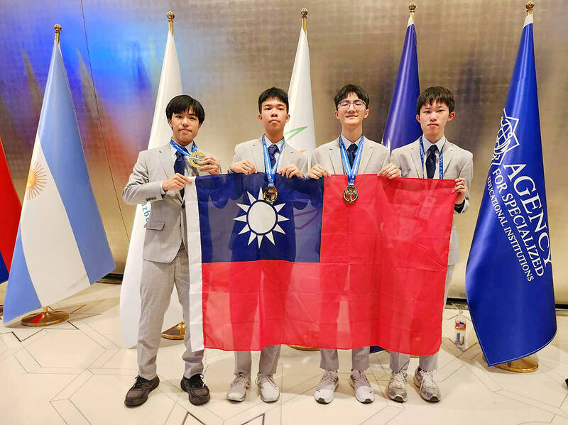 Taiwanese students, from left, Fang I-chen, Fan I-yang , Chang Chen-jui, and Cheng Ping-hao win three gold medals and one silver at the 58th International Chemistry Olympiad in Tashkent, Uzbekistan.
Photo courtesy of Ministry of Education