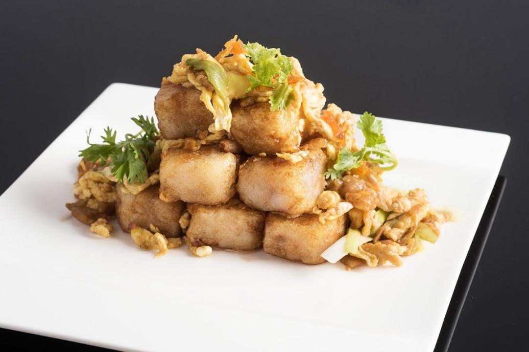熱炒類主食XO醬桂花蘿蔔糕，融合香氣馥郁的桂花蜜。（圖／業者提供）