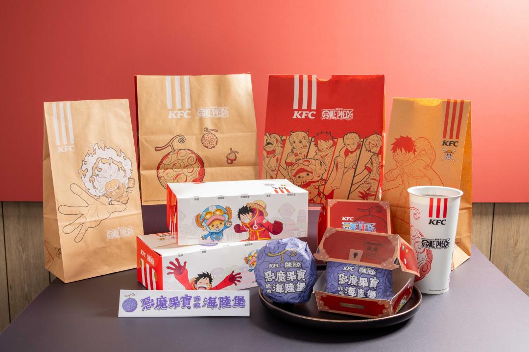 「惡魔果實咔啦海陸堡」推出限量聯名包裝，漢堡包裝紙化身為「惡魔果實」，「航海王藏寶箱」造型漢堡盒猶如打開美味與驚喜的密碼。（圖／品牌提供）