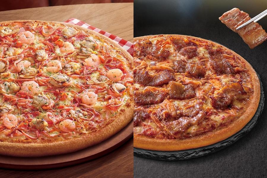 必勝客「人事異動公告」揭曉,招牌商品升級「韓式泡菜豬五花」、「經典海鮮四重奏」比薩即日起六都50間門市獨家販售。(圖/必勝客提供)