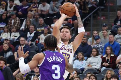 NBA》扯！東契奇轟52分比肩賈霸 「後詹姆斯」湖人寫史無前例壯舉