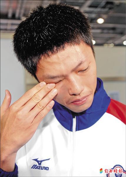 台灣跆拳道小將魏辰洋受訪時流下不甘心的男兒淚。(特派記者林正堃攝) 台灣跆拳道小將魏辰洋受訪時流下不甘心的男兒淚。(特派記者林正堃攝)
