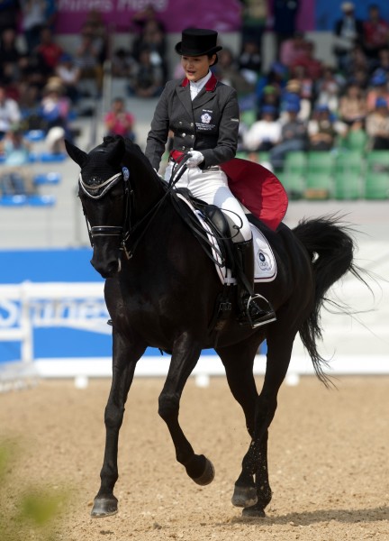 今天下午所舉行的馬場馬術團體賽,台灣馬術代表隊選手張玉潔等人,以平均67.386分奪下銅牌。(記者林正堃攝) 今天下午所舉行的馬場馬術團體賽,台灣馬術代表隊選手張玉潔等人,以平均67.386分奪下銅牌。(記者林正堃攝)