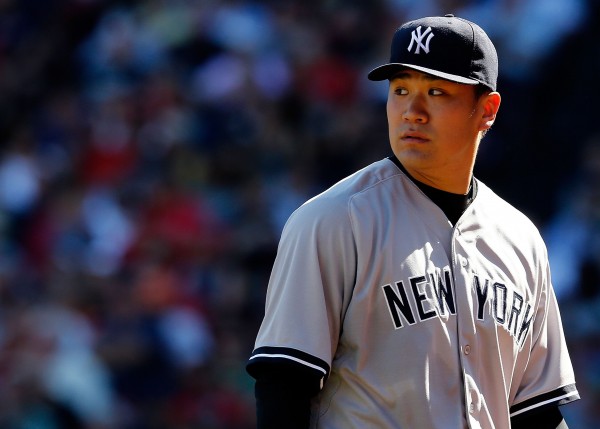 田中將大笑說，達比修今年10勝中的1勝應該算在他身上。（法新社）